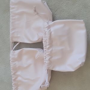 3 biossance vegan leather pouch